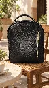 Mochila floral PRACCi en café soleado.webp